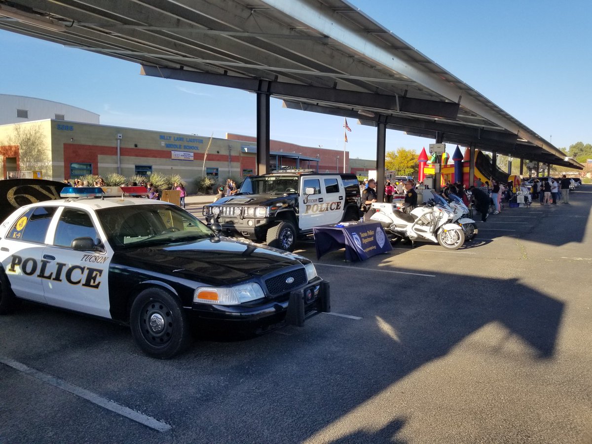 JoinTucsonPD's tweet photo. Family Fun Night at Lauffer Middle School @TPDK9Loki and TPD Motors are here talking with kids! https://t.co/VS5IEFSTvq