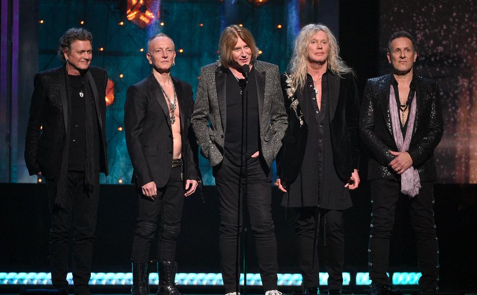 RollingStone's tweet photo. Read Def Leppard's celebratory #RockHall induction speech https://t.co/uVnHujykMr https://t.co/nMbtNEN2eC
