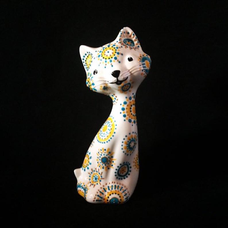 Hazceramics's tweet photo. This pretty cat is painted in my sunburst design and is available in my etsy shop priced at £14.99 with free uk shipping. This is now the last of this shape as i have retired it now. https://t.co/bpR2Bb6Hoz #ukgifthour #ukgiftam #caturday #crafturday #SaturdayMorning https://t.co/9TGBNYToqm