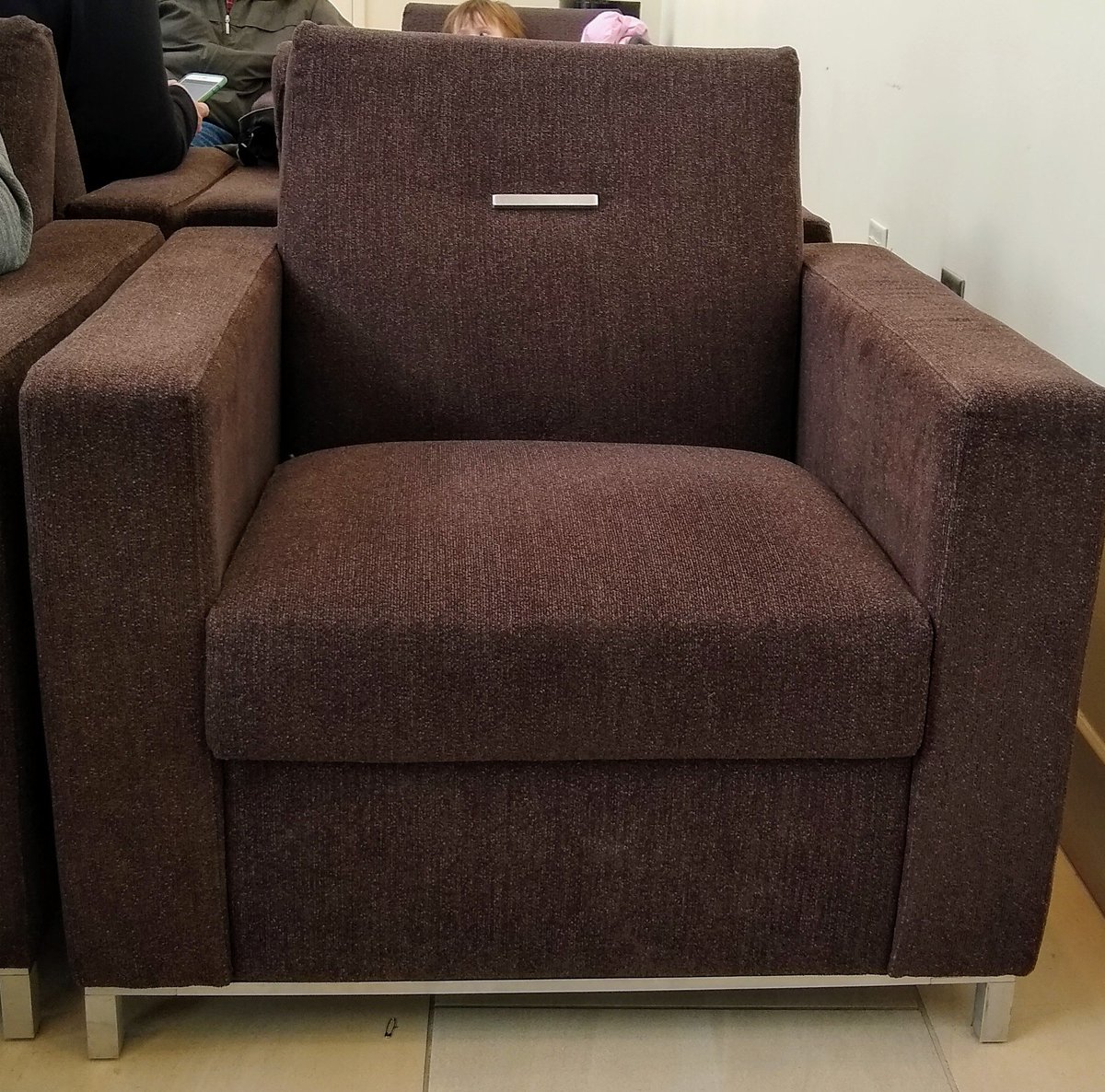 Whoever designed this chair wasn't going for comfort. The metal accent piece doesn't really feel good on your back.