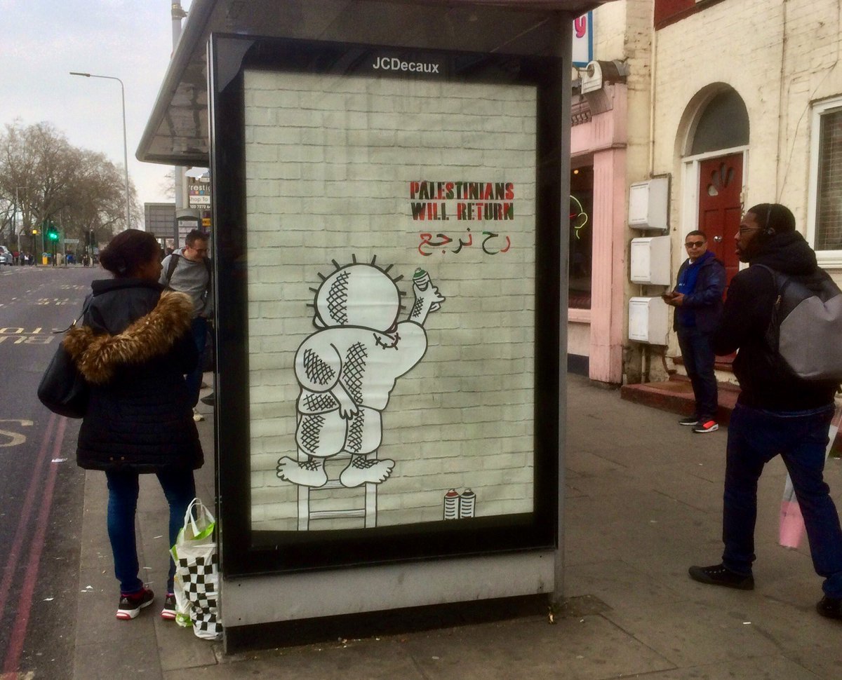Bus stop with poster ‘Palestinians will return’
