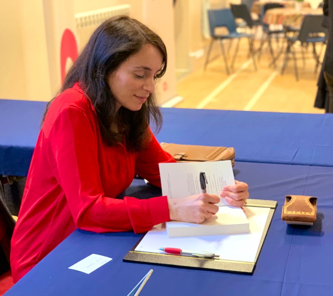 gibrides's tweet image. Nuala signing copies of GI Brides at the @AlderneyLit Festival last night.