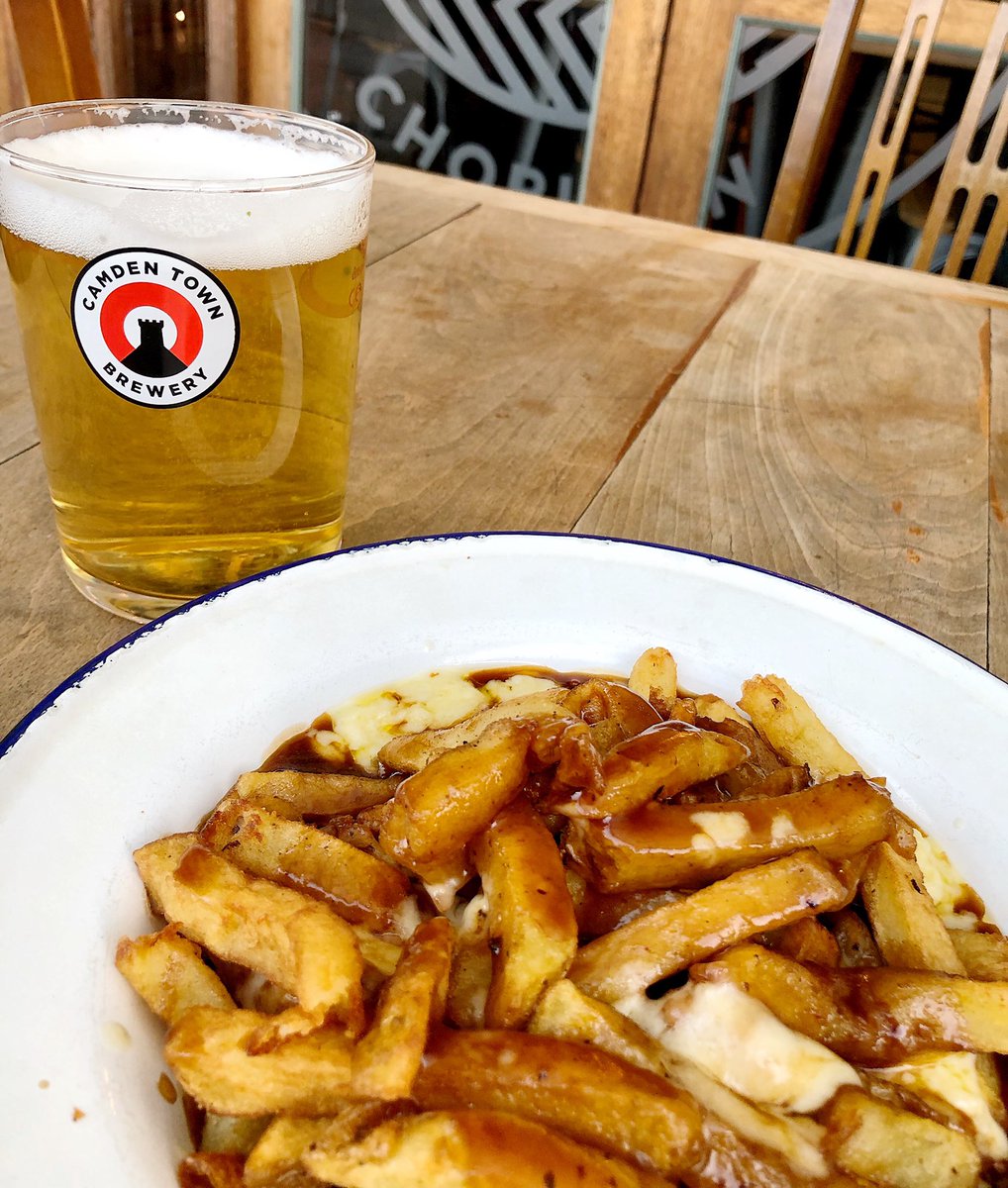 Summertime starts tomorrow - still a bit chilly outside, but a <a href="/CamdenBrewery/">Camden Town Brewery</a> #CamdenHells at <a href="/BrewskiChorlton/">Brewski Chorlton</a> #Poutine will make it better