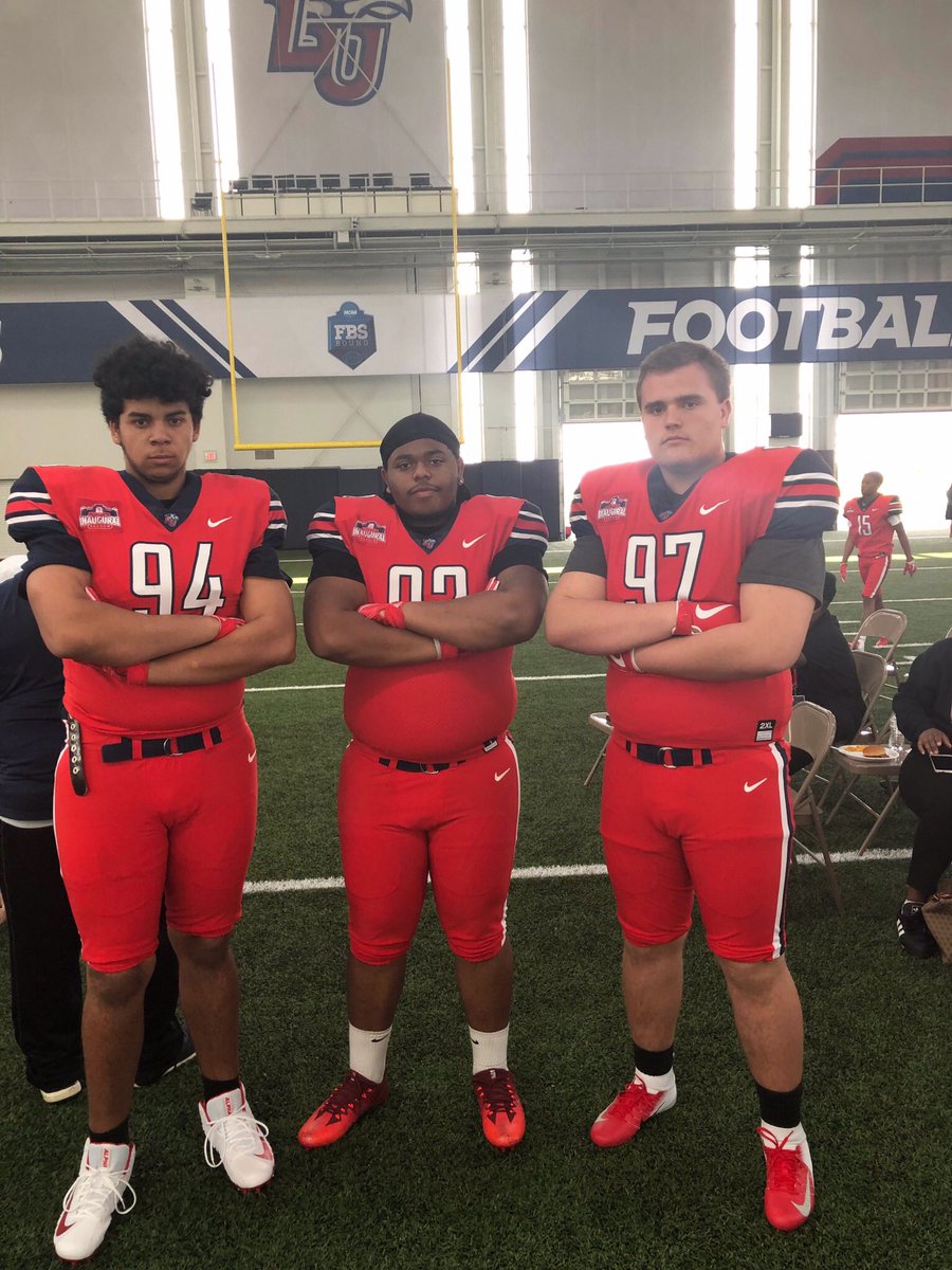 FBCoachMcDonald's tweet photo. "The Big Three." Strength, Skill and Determination personified. Congrats  on your Liberty University Junior Day. #RockintheRed #KingGeorgeFootball https://t.co/5hbTmQabNn