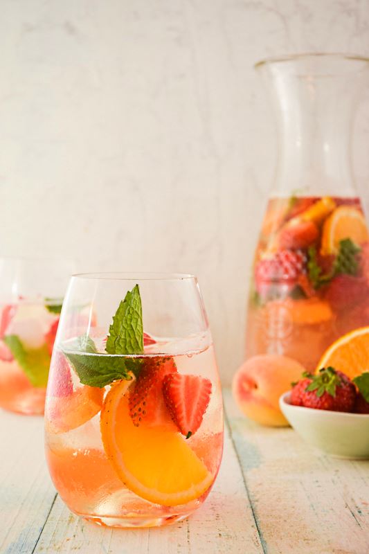 Spring White Wine Sangria with Fresh Peppermint from <a href="/inthekitchnet/">In the Kitch</a> 
Foodista's Drink Blog of the Day! foodista.com/dbodnew #Foodista #DBOD #Drink #cocktail #springdrinks #beverage #sangria #peppermint #summerdrink #weekenddrinks