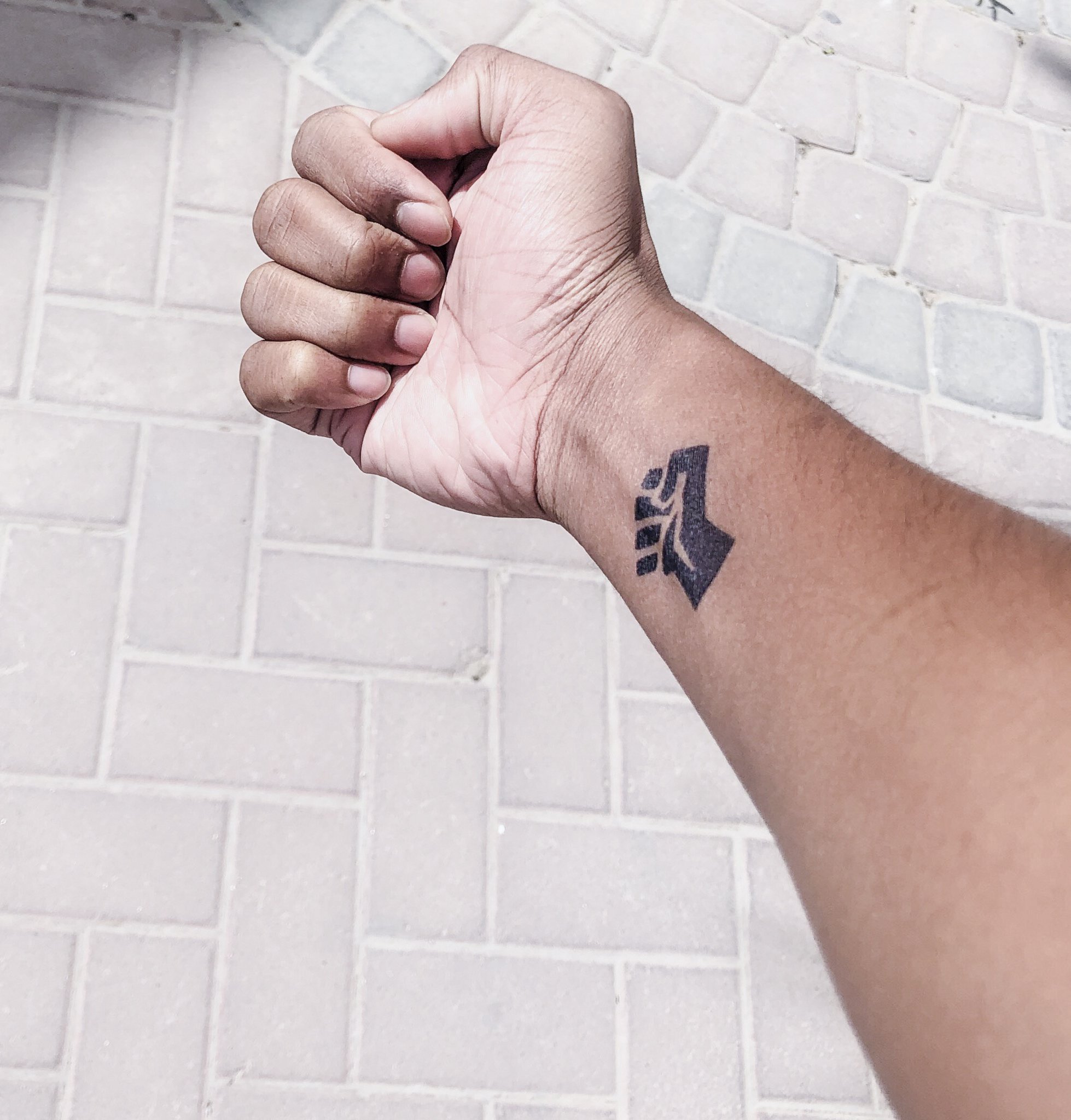 freedom tattoo on wrist