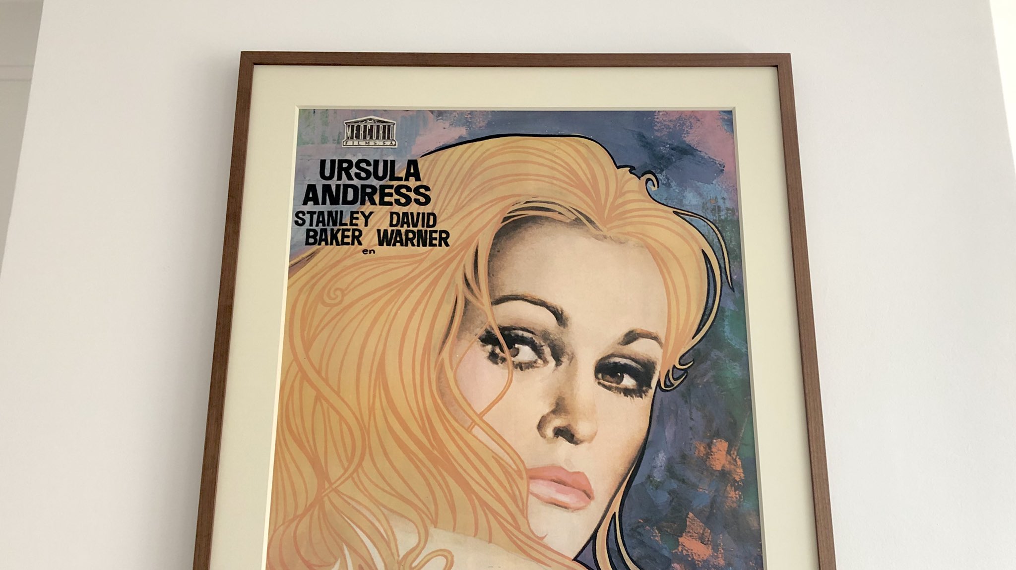 Happy Birthday to Ursula Andress... and here she is looking down at me from above the fireplace as usual 