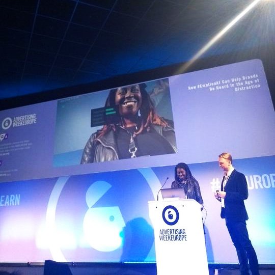 realeyesit's tweet image. Volunteer on stage trying out @realeyesit #EmotionAI app at workshop with @mihkeljaatma to show how #FacialCoding works #AdvertisingWeekEurope