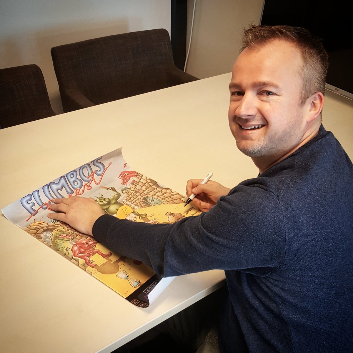 bwbgames's tweet photo. BwB's Laurens programmer of the C64 game #Flimbosquest, is signing the Flimbo game poster. Thanks @Alexwinniczuk and enjoy your signed version. Cheers! #boyswithoutbrains #c64games #c64 #c64programming #commodore64 #gameposter #poster #signing #retrogames https://t.co/7qUbpJUgEx