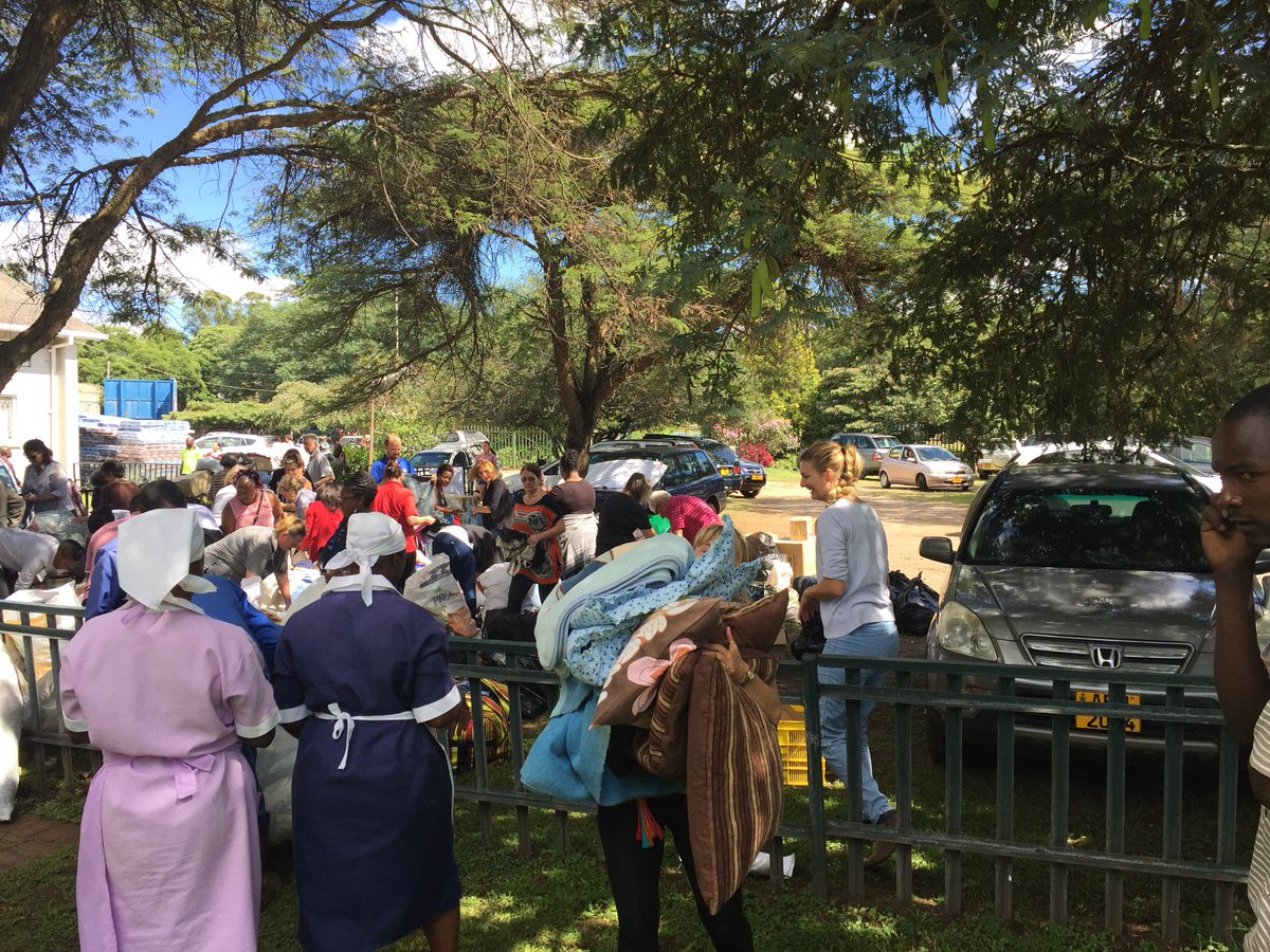 WilliamwidzoPil's tweet photo. Incredible relief effort underway around the country, this is the Highlands Presbyterian drop off centre in Hre, well over 100 volunteers packing relief items, being overwhelmed by the massive volume of donations. This is Zimbabwe at its best ... so proud!!! Awesome!!! https://t.co/2i5AnUwUJz
