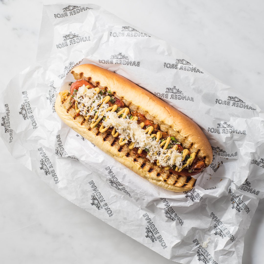 Introducing Banger Bros' 'Coney Island' dog - cheddar, chilli beef, continental mustard and red onion sit snugly in a brioche roll with our trademark Bockwurst sausage. 
.
.
#food #hotdog #foodie #bangerbros #streetfood #brioche