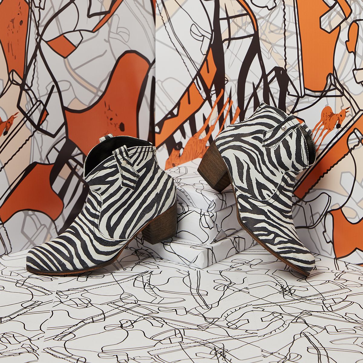 Blending the Wild West with WILD PRINTS! The Black &amp; White Mountain Boots cover all must-have trends and are an absolute wardrobe essential. <a href="/schuh/">schuh</a> bit.ly/ZEBRAROD