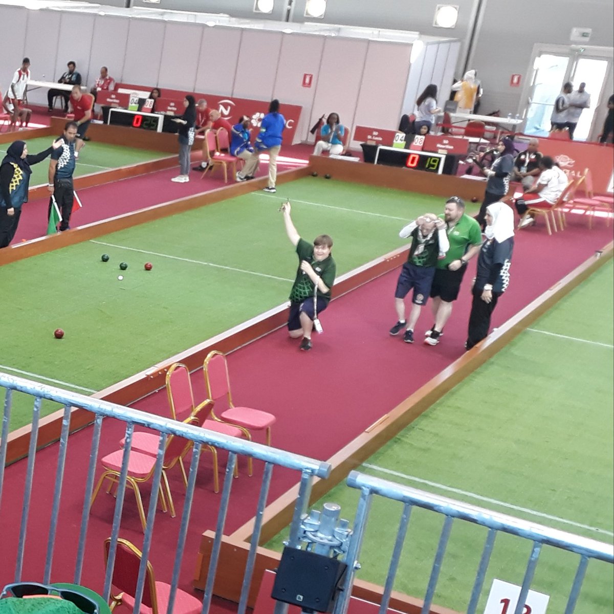 BocceSoi's tweet photo. It's a win for the men's doubles game against Morocco!!! Look at the support watching it, just amazing. We have athletes from @FootballSoi @BadmintonSoi @GymnasticsSoi  @KayakSoi and loads more! 😍💚⚪🧡
 #TeamIreland #AbuDhabi2019 #meetthedetermined https://t.co/p2oeTsC5Un