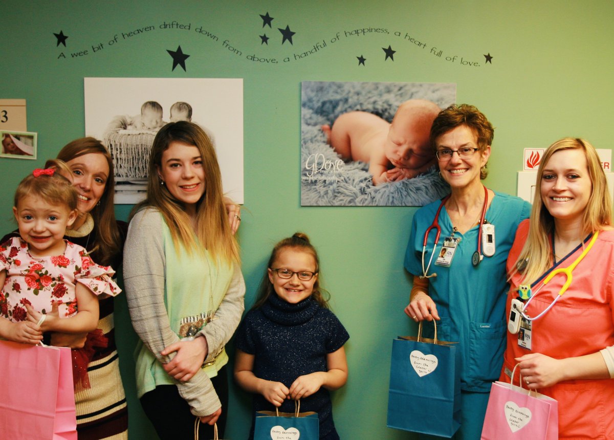 DCHS49801's tweet photo. For the second time in 3 years, the Glaser family donated
gift bags to the DCHS OB Department.  The bags are given to the mothers of new born
children and include a hard cover children’s book, a stuffed animal, and some warm, fluffy socks. Thank you Glaser Family! #ichooseDCHS https://t.co/LjZFAmslJQ