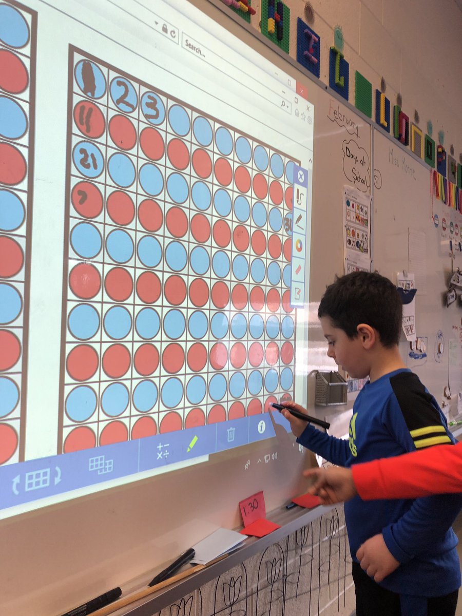SLRMRSSB's tweet photo. Putting 10s into a 100 frame! Counting them out and then figuring out where numbers would go! #mathfdk #numbersense #skipcount10s #learningfdk https://t.co/4JaW6sIhI0