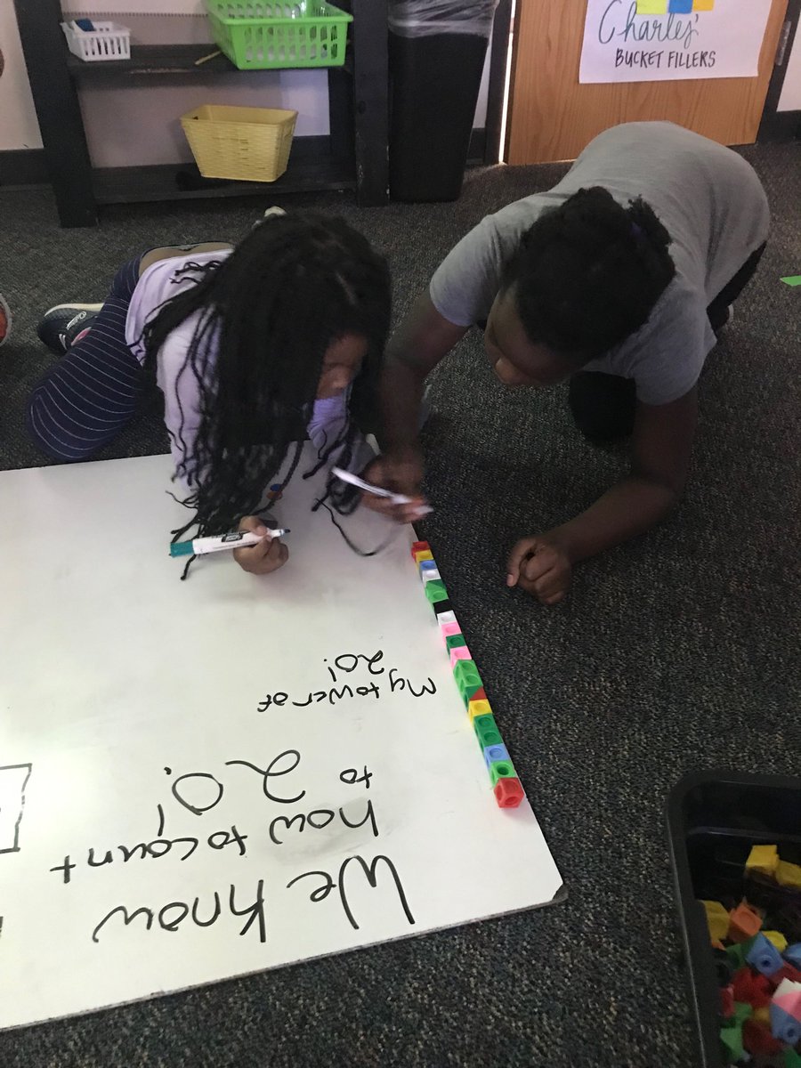 CharlesmMary's tweet photo. 3rd grader helping a Kinder friend count to 20!⁦@ElliottLearners⁩ https://t.co/cC3vV53SBa