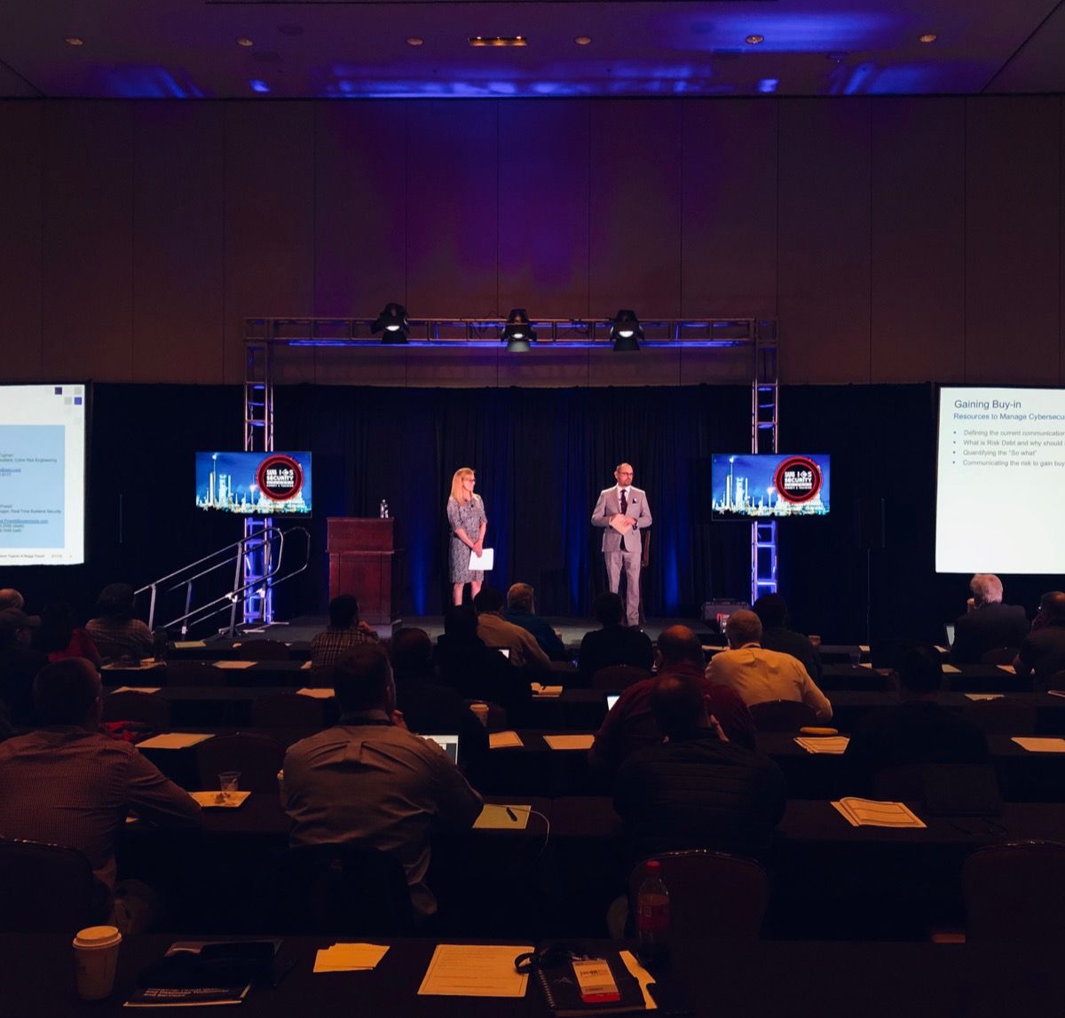 Our impeccably dressed <a href="/JasonTugman/">Jason Tugman CISSP, CRISC</a> and <a href="/Exelon/">Exelon Corporation</a>'s Maggy Powell presenting at #SANSOrlando on "How to Gain Buy-In Across Your Organization to Manage #Cybersecurity Events". View their presentation here: bit.ly/2TjCcqq #ICSSummit