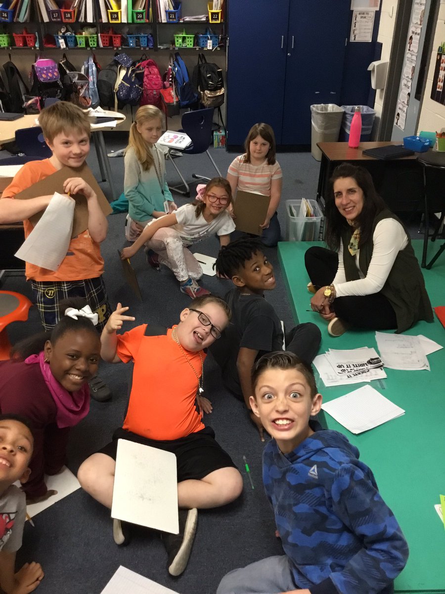 Ruby__Bryant's tweet photo. It warms my heart to see Ms. Kane sitting on the floor with students and engaging them with @reagantunstall ‘s Math Chats! The teachers and support staff on our campus remind me of how it truly takes a village in growing our students! #SVE #ThisIsMidway https://t.co/jTFYJckPdI