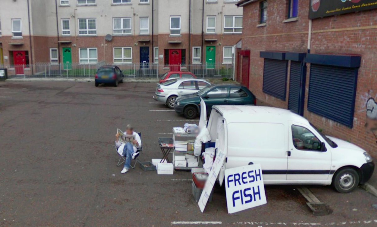 Fishmonger in a carpark, the top road.August 2008.