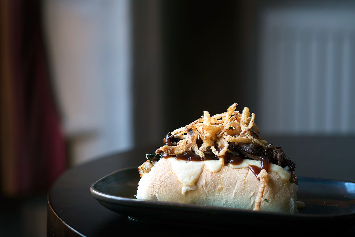 RoastBrighton's tweet photo. Roasts aren't just for Sundays and dogs aren't just for Christmas - you can have this dirty dog every day of the week at The Cricketers 🐕 Made with rare breed bratwurst and BBQ pulled pork, served with tripple cooked chips #hotog #brightonpub  https://t.co/BRxuzQdAXi https://t.co/DC6mvOIpnb