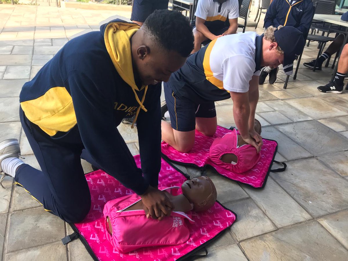 NSRI's tweet photo. We are in Port Elizabeth demonstrating #watersafety and #CPR to the Madibaz Varsity Cup team. These safety sessions are part of the partnership between the #NSRI and @PCMFSouthAfrica which is the 2019 @varsitycup charity Watersafety and CPR save lives!  #PinkShorts https://t.co/bheED2uyJ7