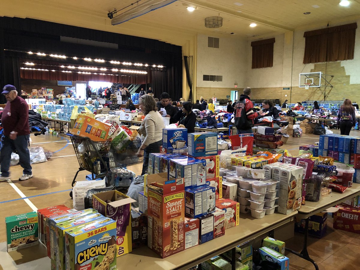 rachael_miner's tweet photo. I’m in Fremont at the City Auditorium where donations from across the state and country are pouring. Most of the families coming through have nothing but the clothes on their back. Hear more tonight at 5, 6, and 10 p.m. https://t.co/Os0vuD7Bs8