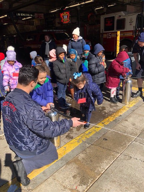 PS142M's tweet photo. Kindergarten took a trip to our local fire station at 25 Pitt Street! They learned so much and got to meet mascot Ashley! @FDNY #fdnyengine15 #probyash #fdny #localheroes #district1nyc https://t.co/AfV2Qsk58P