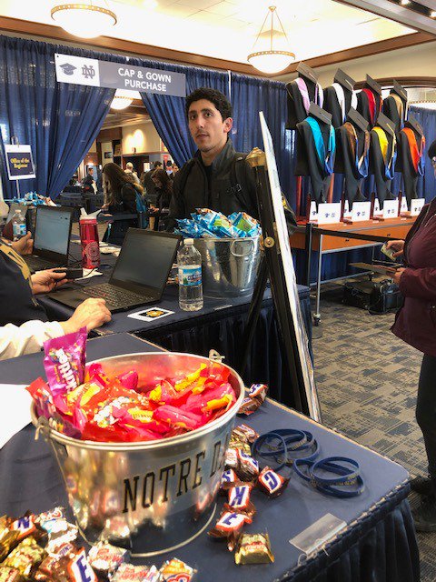NDCommencement's tweet photo. Come on out to the @HammesNotreDame for the Graduation Fair. We are open until 7:00pm. Get your cap &amp; gown, announcements, graduation photos, and more!! https://t.co/vXcU8EXcRd