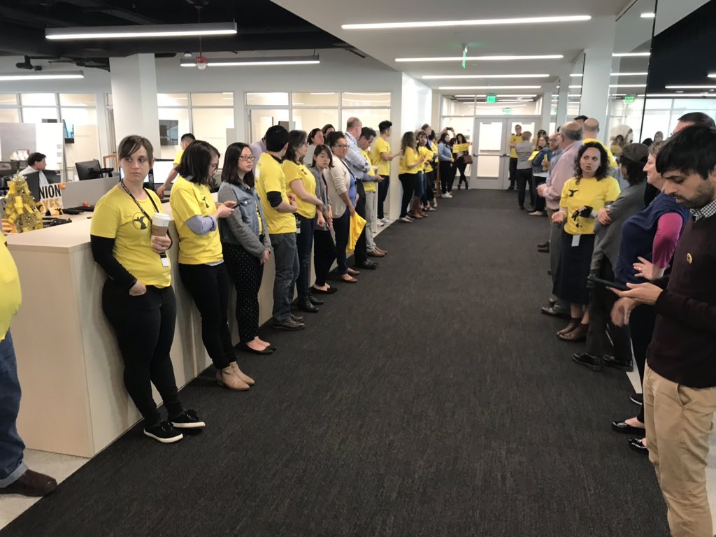 mattdpearce's tweet photo. .@latguild lines the hall outside today’s editors’ meeting to show management our support for a strong contract. https://t.co/3mLTWlez7N