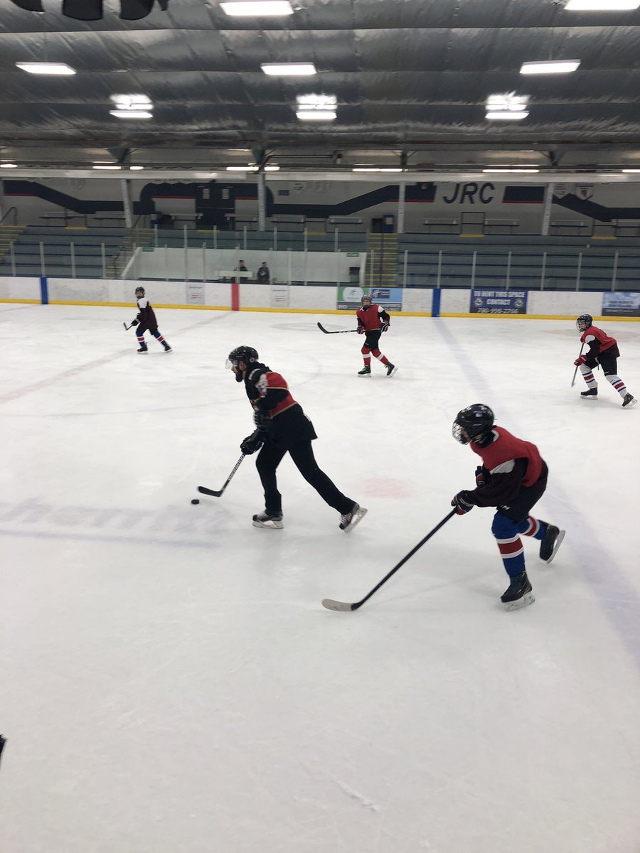RobertStecyk's tweet photo. What a great way to start the day building relationships, supporting school programming and strengthening school-Parish connections. Thanks to Fr. Kris for coming out to play ringette and hockey with our @stjp2cs Sport4Life students @EICSTalks #GodsMasterpiece https://t.co/QqPVJKlR63