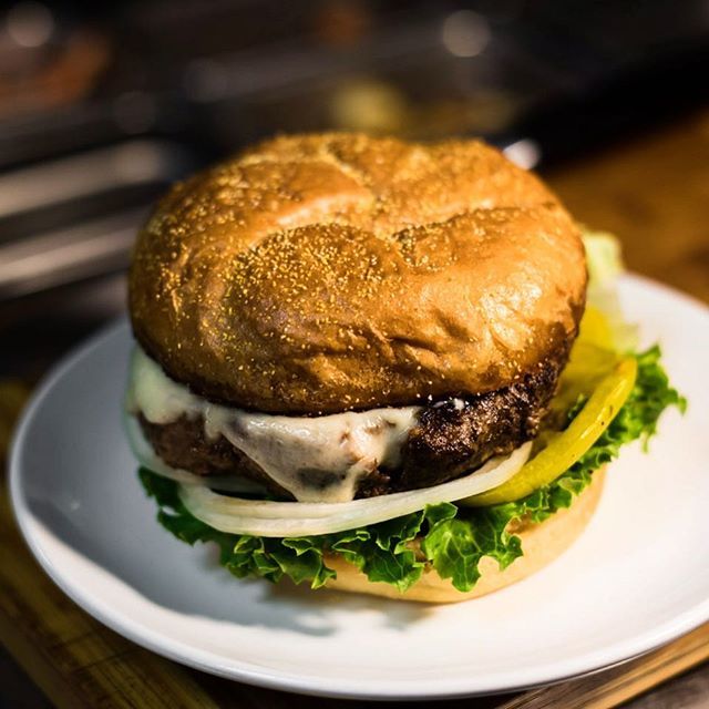 Reeds Cheeseburger with pickled green tomato, white onion, lettuce and aioli. $10 on happy hour Monday - Thursday 5-7 and Sunday 5-9 
Check out the new things on the menu if you haven’t been in a while