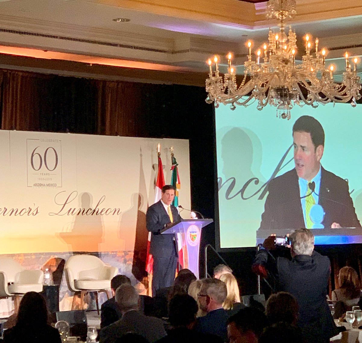 NogalesChamber's tweet photo. Governor @dougducey speaking at the Governor’s Luncheon about the mutually beneficial trade relationship where it has already increased by $16.6 billion dollars. @AzMxCom #SupportTrade #Arizona #Mexico https://t.co/YHzs0PGijk