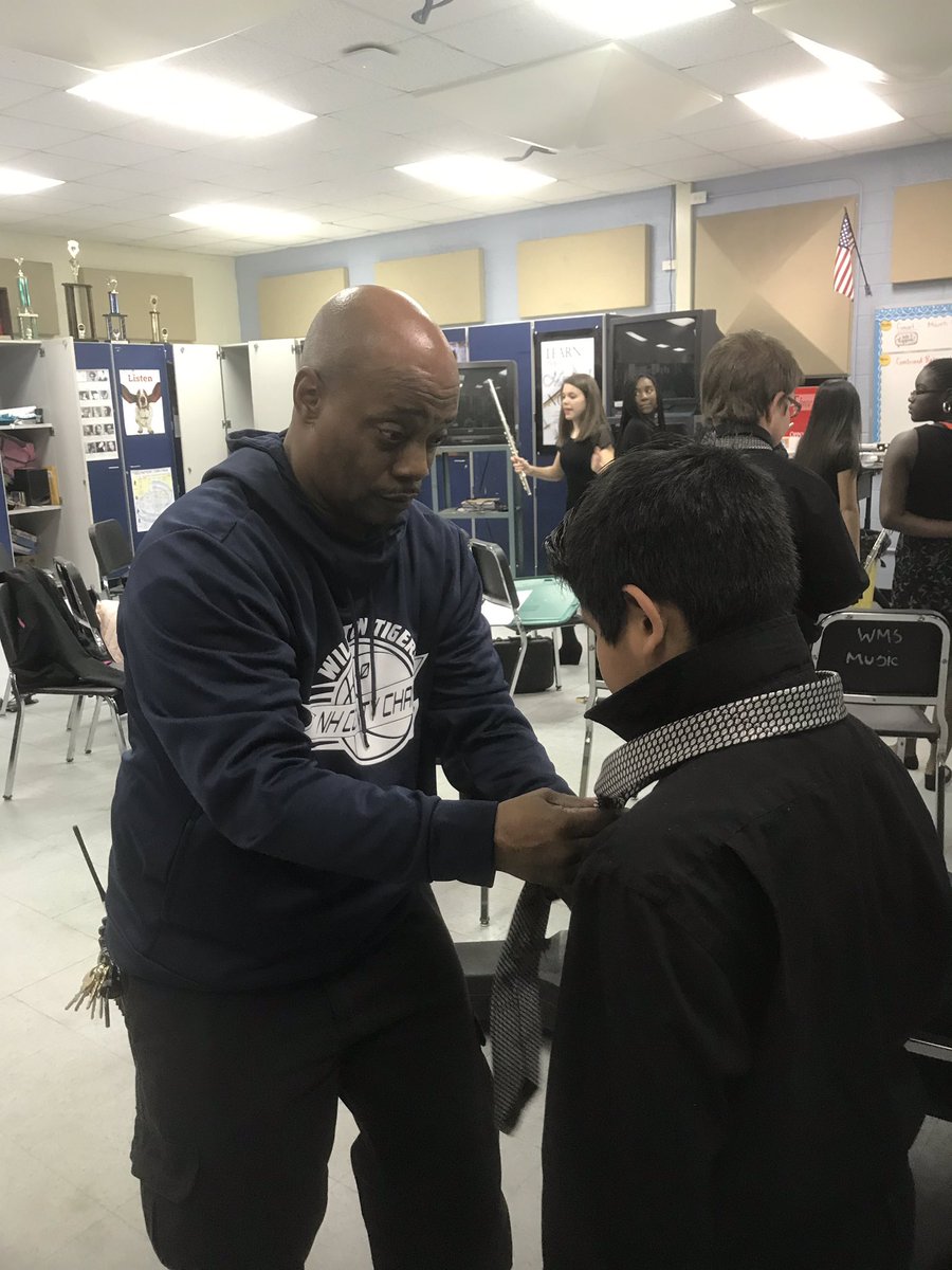 I know lots of people say, “it takes a village”, but we <a href="/WillistonTigers/">Williston Tigers</a> use this beautiful village, we call ours, day in and day out! Even when our fellas need help with ties 4 their concert, our amazing custodian and father helped nearly 10 boys look sharp! #proudAP