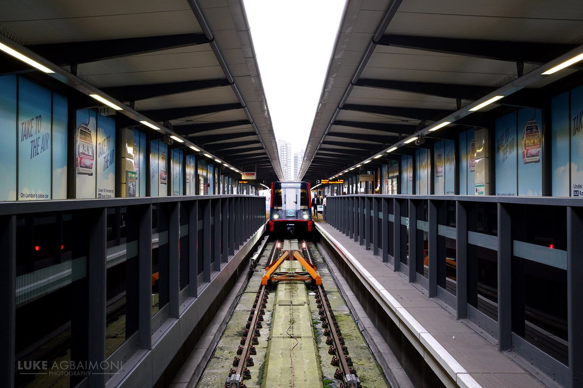 LONDON UNDERGROUND SYMMETRY PHOTO / 26TOWER GATEWAY DLR STATIONShot of a parked Docklands Light Railway train as you enter the stationMore photos https://shop.tubemapper.com/Symmetry-on-the-Underground Photography thread of my symmetrical encounters on the London UndergroundTHREAD