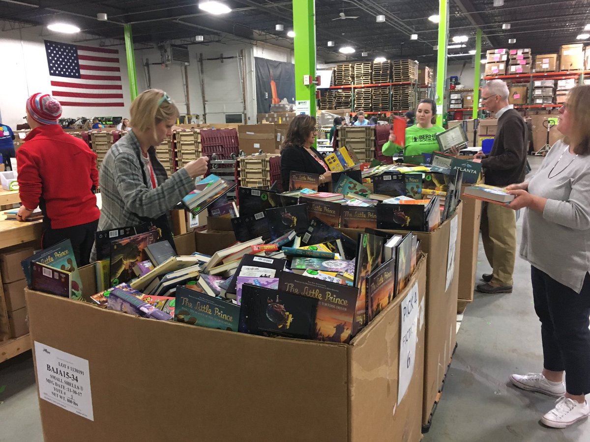 AllisonSobotka's tweet photo. Roosevelt teachers took a trip to Bernie’s Books today to sort and bag some books #EngageD64 #D64smiles https://t.co/Epc60yy4in