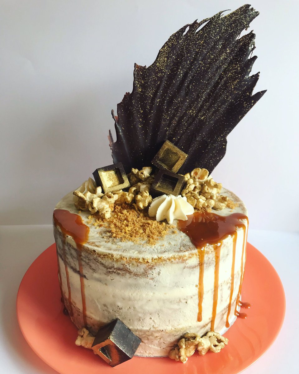 Ginger, pumpkin and dark chocolate cake with a toffee drip, popcorn, homemade chocolates and crushed ginger biscuits.😋 #HappyHumpday