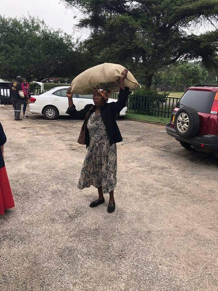 powerfmzimbabwe's tweet photo. This Wednesday we are crushing♥️♥️♥️ on this wonder woman.

This gogo had no money for a kombi, she reportedly walked the whole way from Mbare to Highlands just to donate her pots to give to people in Chimanimani at the Presbyterian church. https://t.co/csJLQqF7Ve
