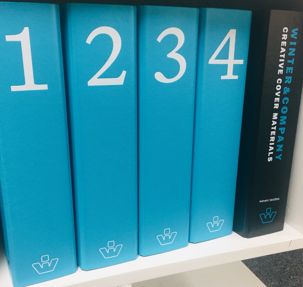 PureprintGroup's tweet photo. Thanks Zoe @WinterandCoUK for updating our #PureprintLondon and Uckfield library with the fab new swatch books. Such a lovely set showcasing amazing materials #bookcloth #creativematerials #Pureprintlibrary #Winter&Co https://t.co/s9SEPEhoI7