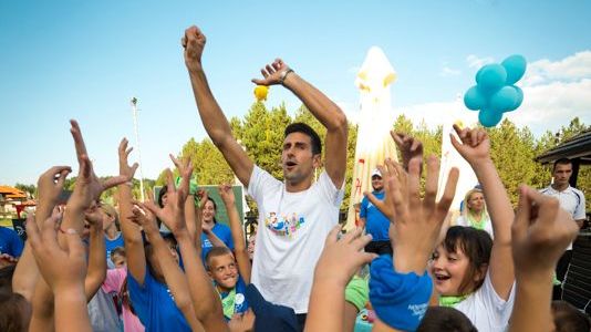 novakfoundation's tweet photo. On #InternationalDayOfHappiness, we are reflecting on every smile our team has witnessed through the gift and power of education and the compassion of our donors. Dancing tends to be a side effect of our joyous work 🤪🕺 @djokernole @jelenadjokovic #TeamNDF https://t.co/j5ZgtBzDlV