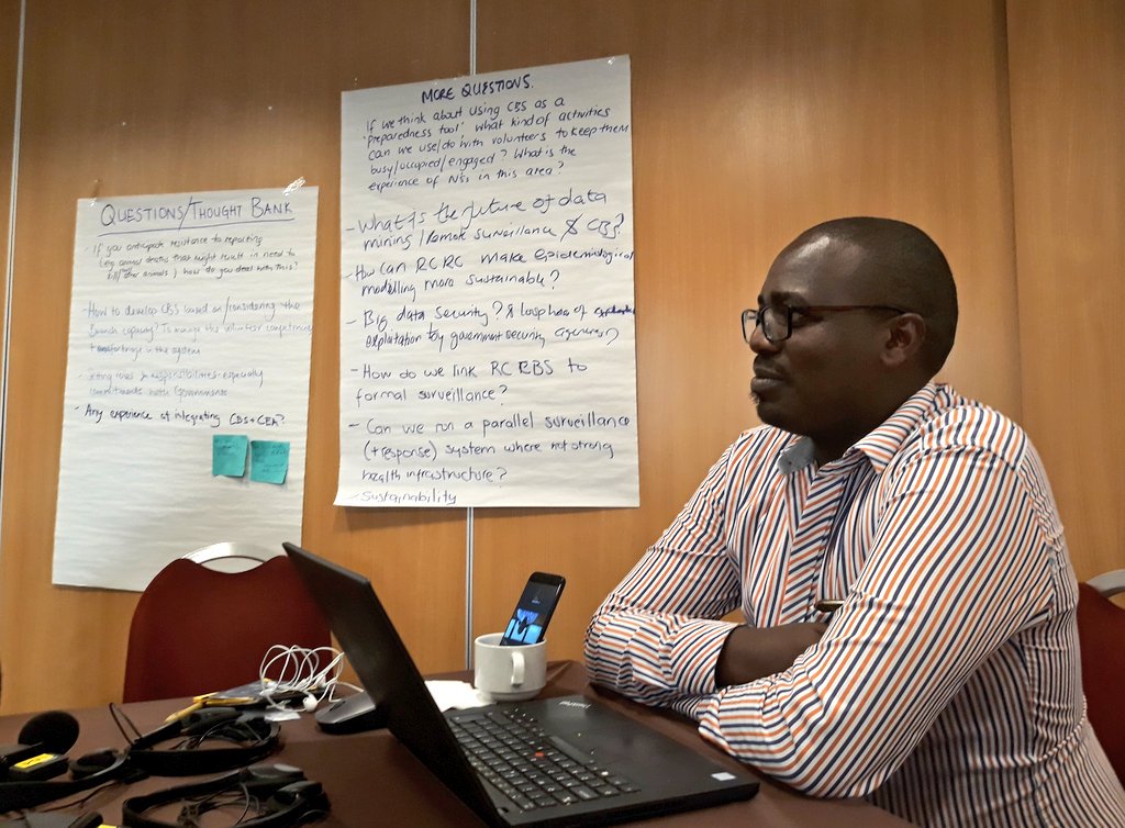 HeatherLeson's tweet photo. Always be connecting(Abc) @ifrc : appreciating the collaboration to help our colleague participate virtually. I give you: Arnold from Uganda joining (in a cup) #rccodeathon #DigitalTransformation #informationsaveslives https://t.co/7Zi0NGgOII