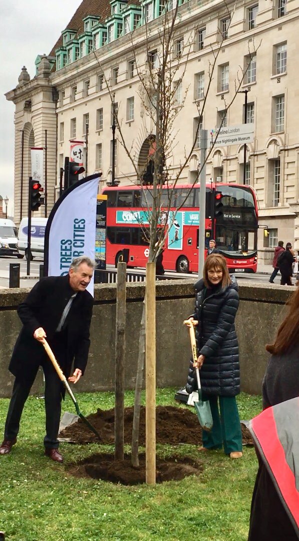 LDN_environment's tweet photo. Great to join @TreesforCities today at their millionth tree planting! What a brilliant achievement. We look forward to working together to plant thousands more trees across London. 
Michael Palin &amp; @PattiHarris planted an Elm and pupils from Dormers Wells planted a Hawthorn https://t.co/N0cUIhYtzW