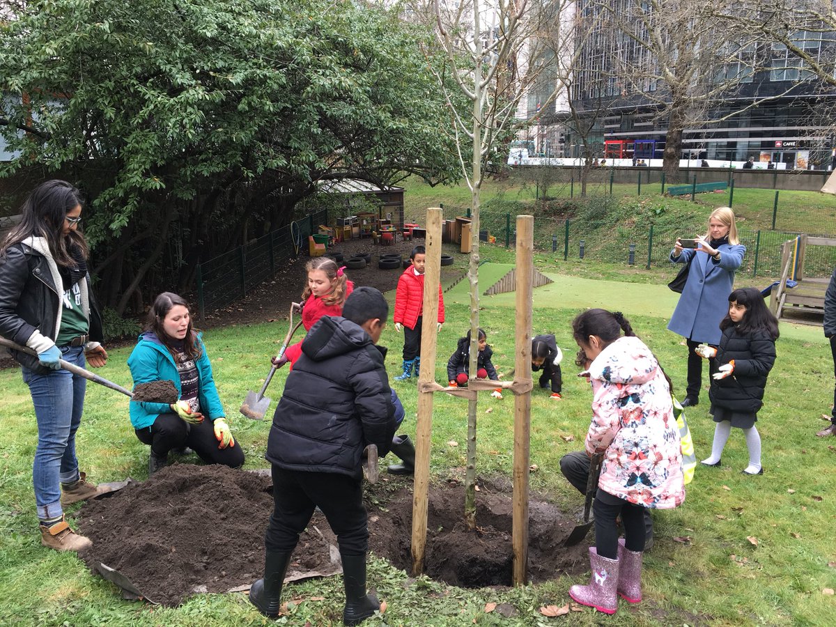 LDN_environment's tweet photo. Great to join @TreesforCities today at their millionth tree planting! What a brilliant achievement. We look forward to working together to plant thousands more trees across London. 
Michael Palin &amp; @PattiHarris planted an Elm and pupils from Dormers Wells planted a Hawthorn https://t.co/N0cUIhYtzW