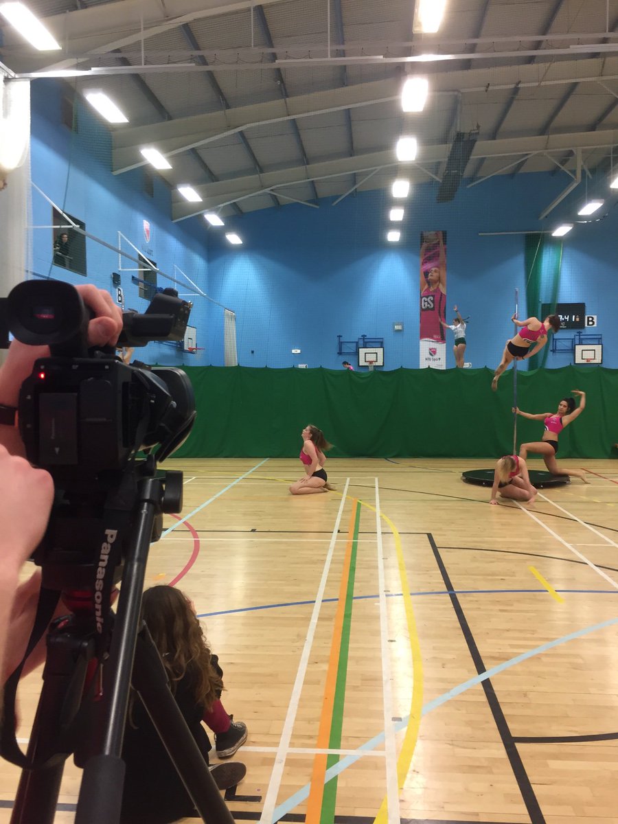 TrentTVSport's tweet photo. Quick performance from @NTU_poledancing before the Wheelchair basketball kicks off at Court 4 at the Lee Westwood Sports Village. #NottsVarsity #RollPink https://t.co/xCSYDnOa5a