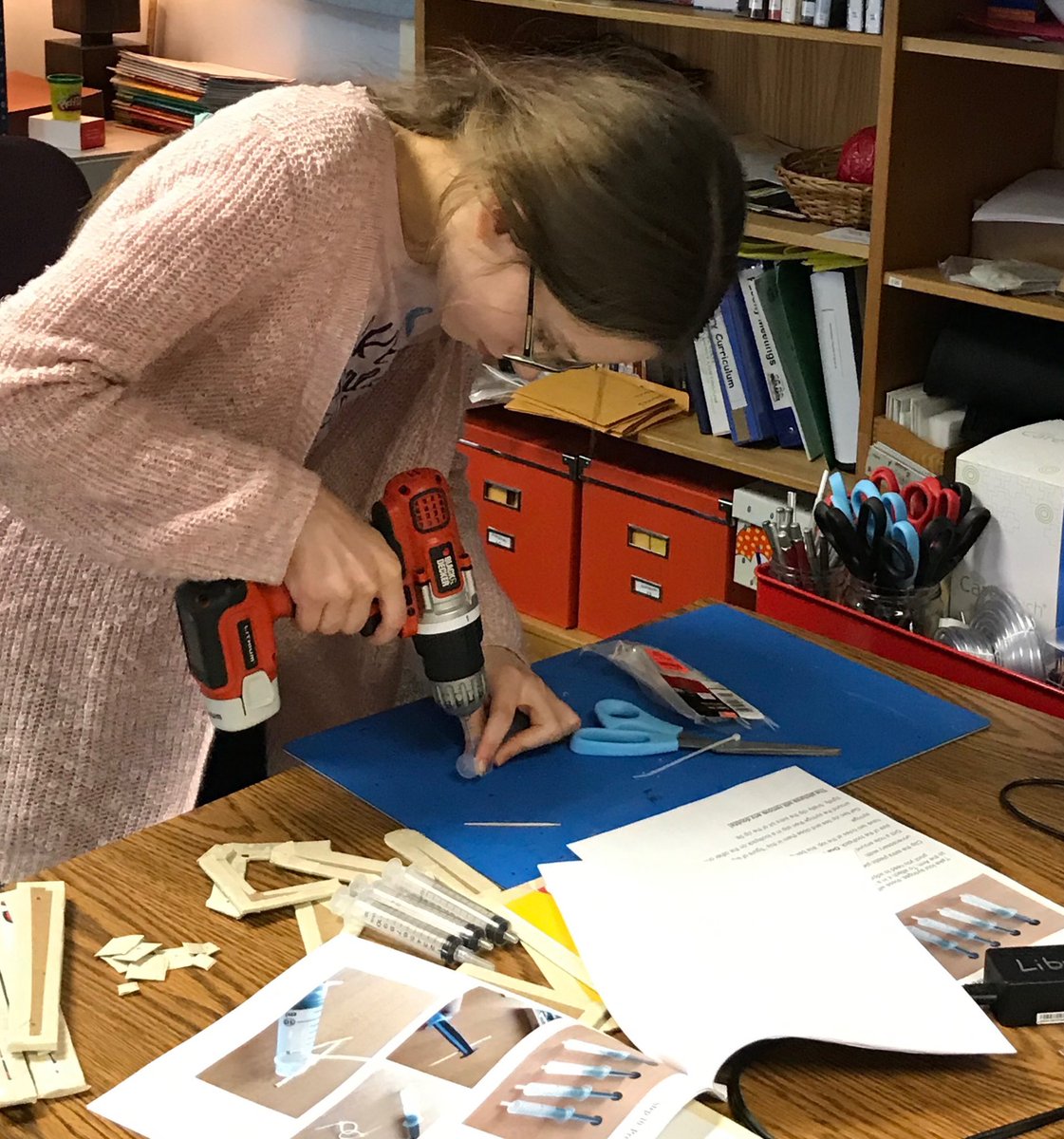Working on making a cardboard hydraulic arm. This month’s makerspace activity at DAKE library.