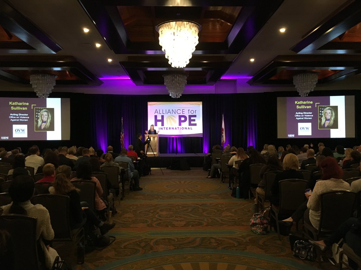 OVWJustice's tweet photo. OVW Acting Dir Katie Sullivan spoke at the #FJCconference about how Family Justice Centers can partner with #ProjectSafeNeighborhoods and U.S. Attorneys to hold DV perpetrators accountable. Full remarks: 
https://t.co/hTObpJkjIs
#HopeRisingScience  #HopeGiver @iam4hope @Casey0034 https://t.co/0yTsGkOmoQ