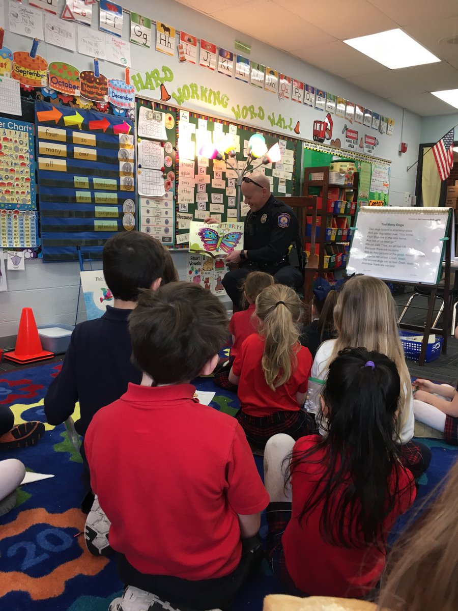 IHMGR's tweet photo. Thanks GRPD Officer Chad VanDam for visiting our classrooms as a guest reader. The students loved having our community police officer as a guest! https://t.co/laxLlbnJBC