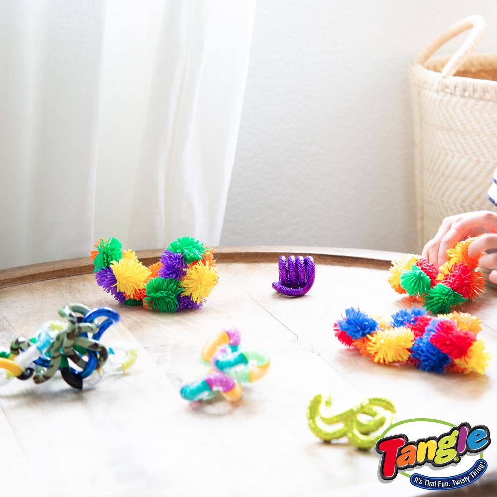 TangleCreations's tweet photo. Whether it's smooth and colorful or fuzzy and soft, #TangleJr is full of surprises! #TangleCreations #FidgetToys #Choices #AmazingToys #BrainToys #ADHDToys https://t.co/R8k4AkLALp