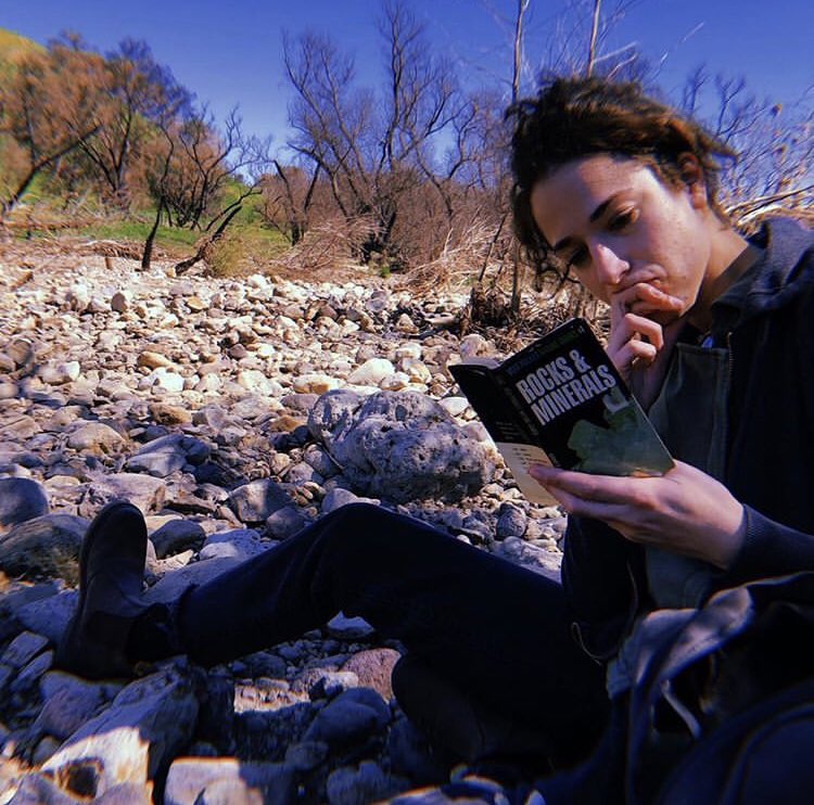 SubatomicEmily's tweet image. My idea of a good time = sitting in a pile of rocks, reading about rocks #geology #geologist #minerals #womeninscience