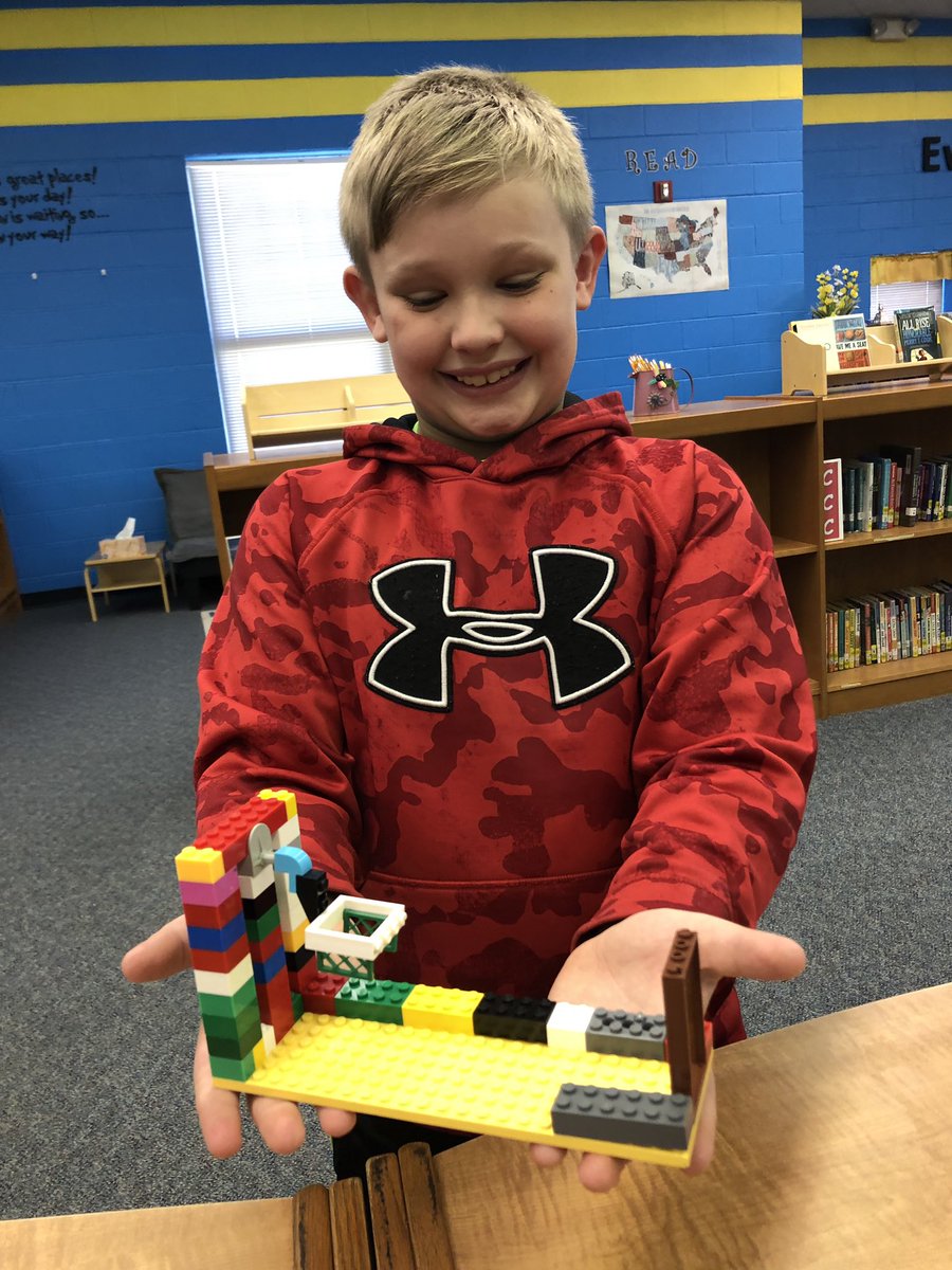 When your librarian is a sports fan you read about James Naismith and build your own basketball goals!!