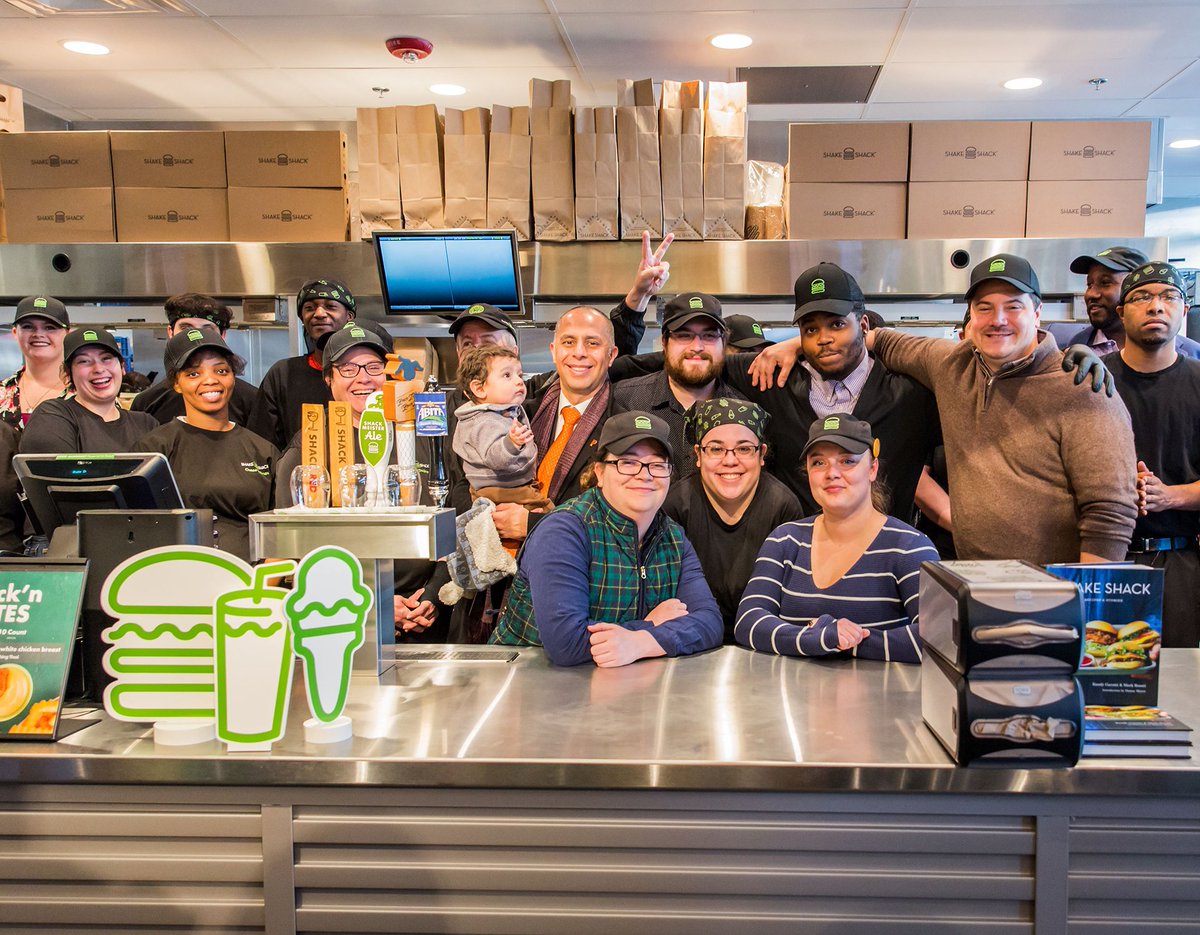 shakeshack's tweet photo. Here’s the 411 on the 401… Today our first Rhode Island Shack opened in Providence! It was a rockin’ time thanks to @ERBBand + the energy of our awesome team. 🙌 Stop by 249 Thayer Street to grab the goods + peep the colorful art by RISD alum @jingnotjane that decks our walls! https://t.co/fvecUOCqpF